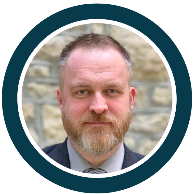 Photographic portrait of SecuR&E Forum 2025 Speaker Chad Coller